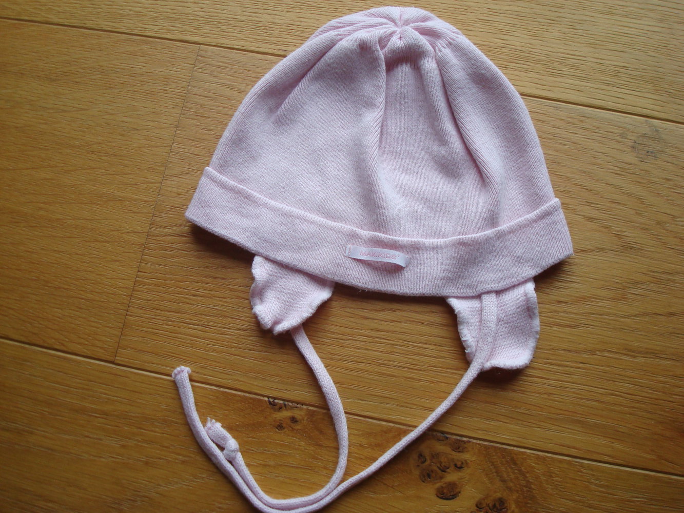 Babymütze, Mütze mit Bindebändern und Ohrenklappen von Mexx