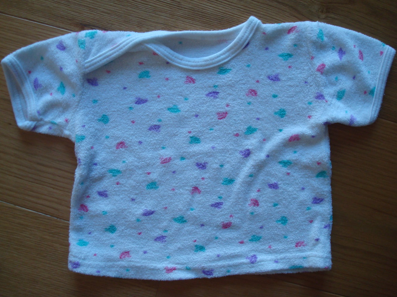 2 Kurzarmshirts / T-Shirts Gr. 62