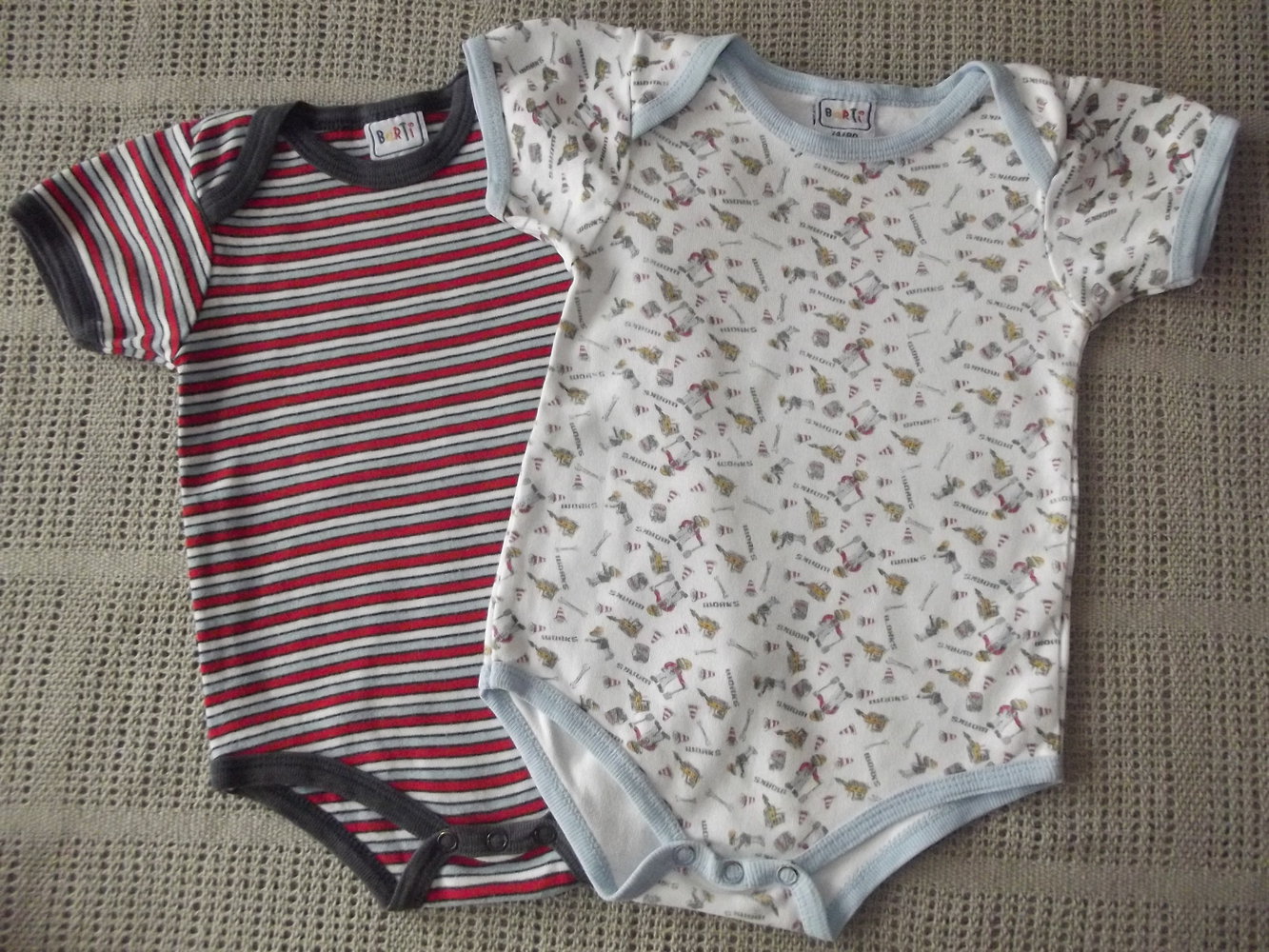 Sieben süße Body´s Gr. 74/80