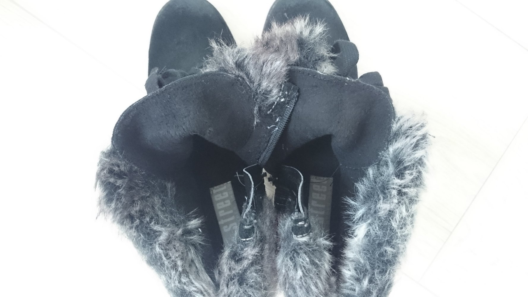 Leder Absatz Stiefelette mit Fell