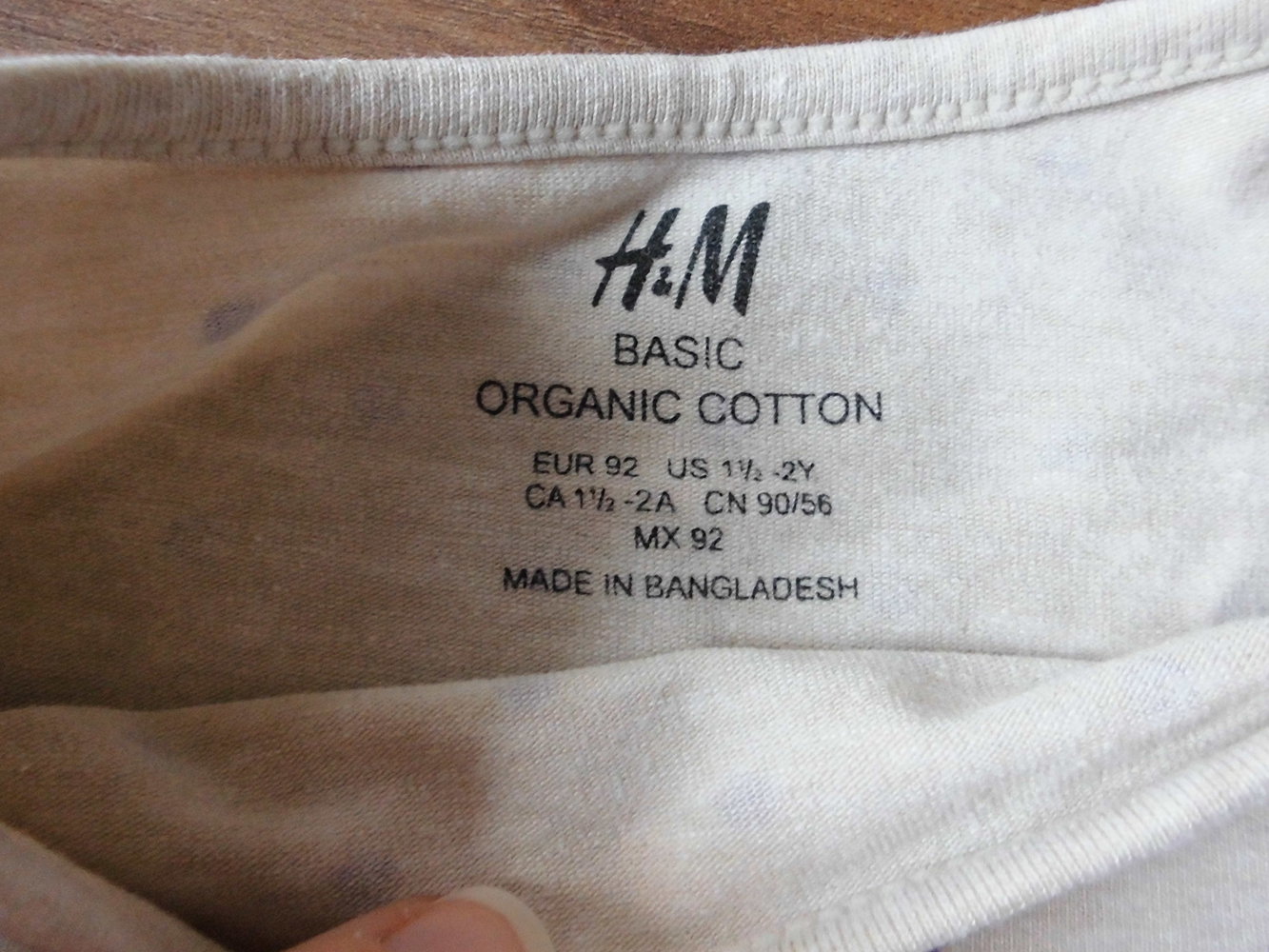 Langarmshirt mit lila Punkten Gr. 92