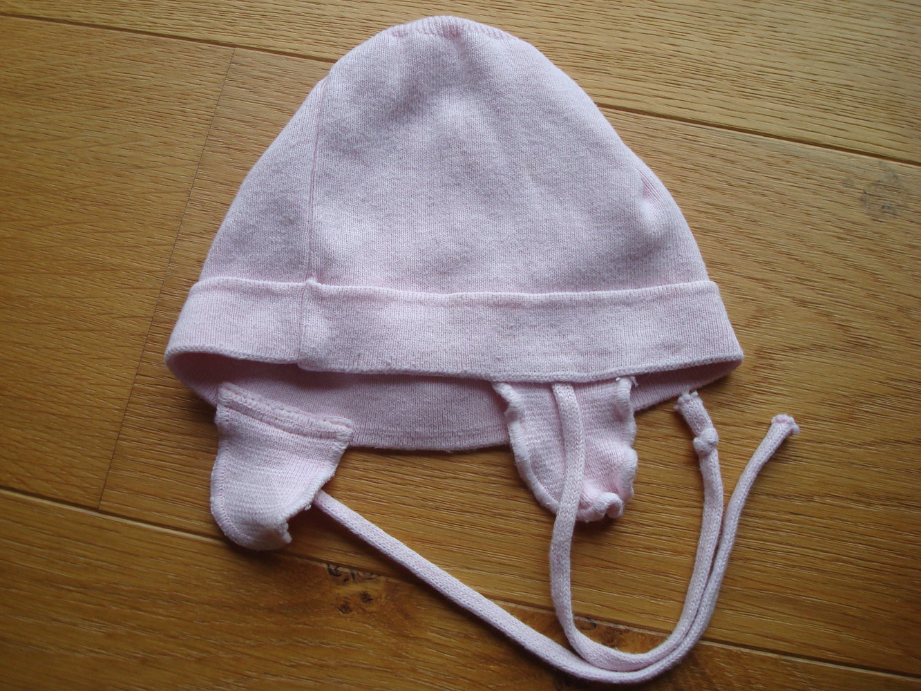 Babymütze, Mütze mit Bindebändern und Ohrenklappen von Mexx