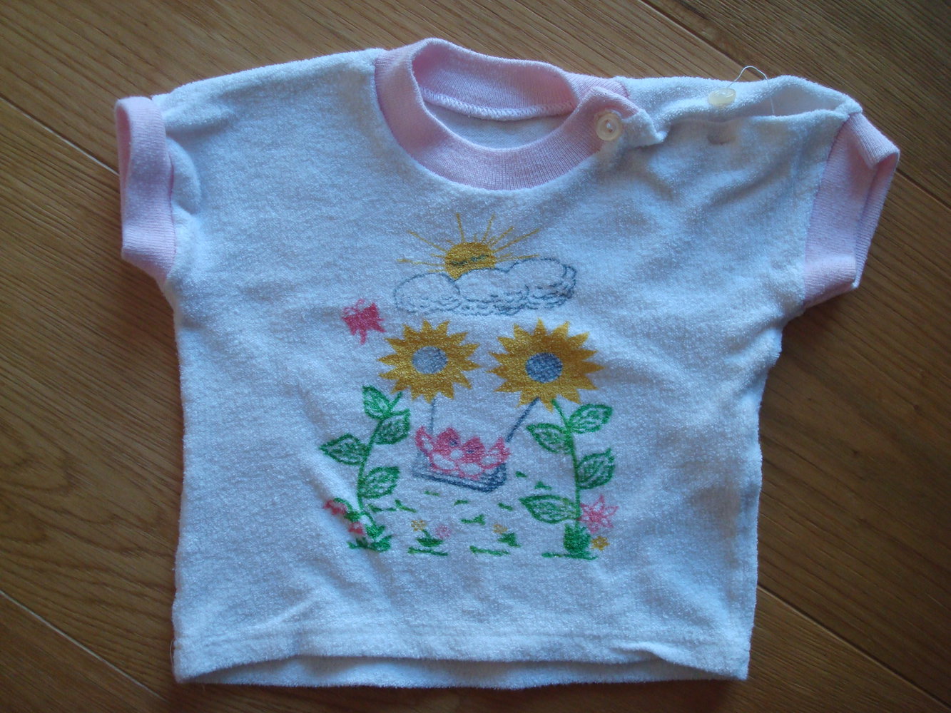 2 Kurzarmshirts / T-Shirts Gr. 62