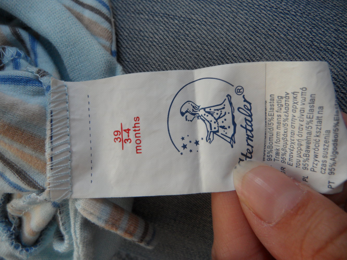 obersüße Mütze mit Bommel Knoten Sterntaler KU 39