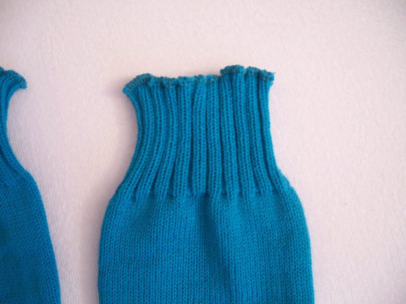 VINTAGE// Stulpen in einem grün-türkisfarbenem Ton