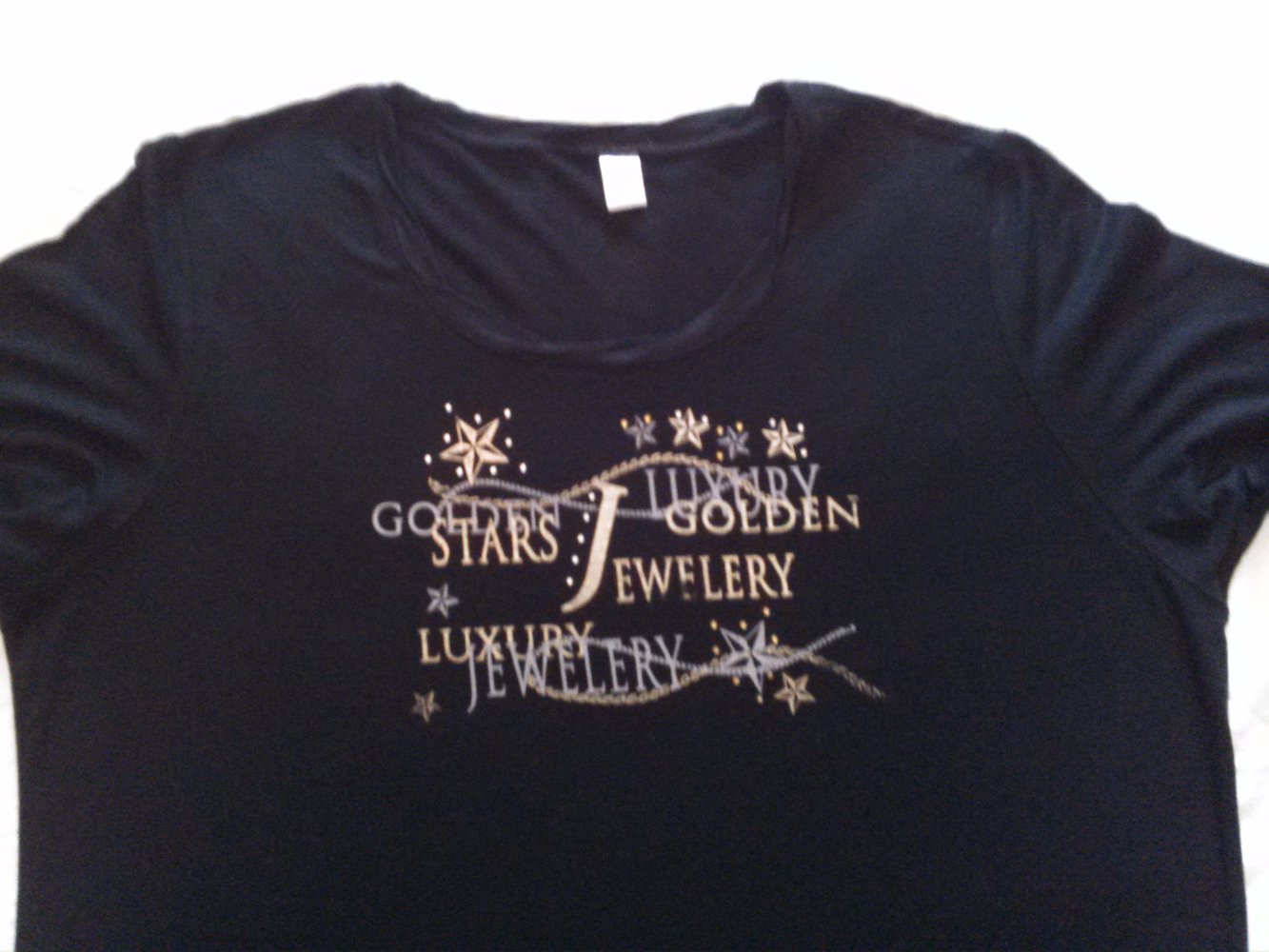 Sehr schönes schwarzes T-Shirt mit Druck Gr. 44