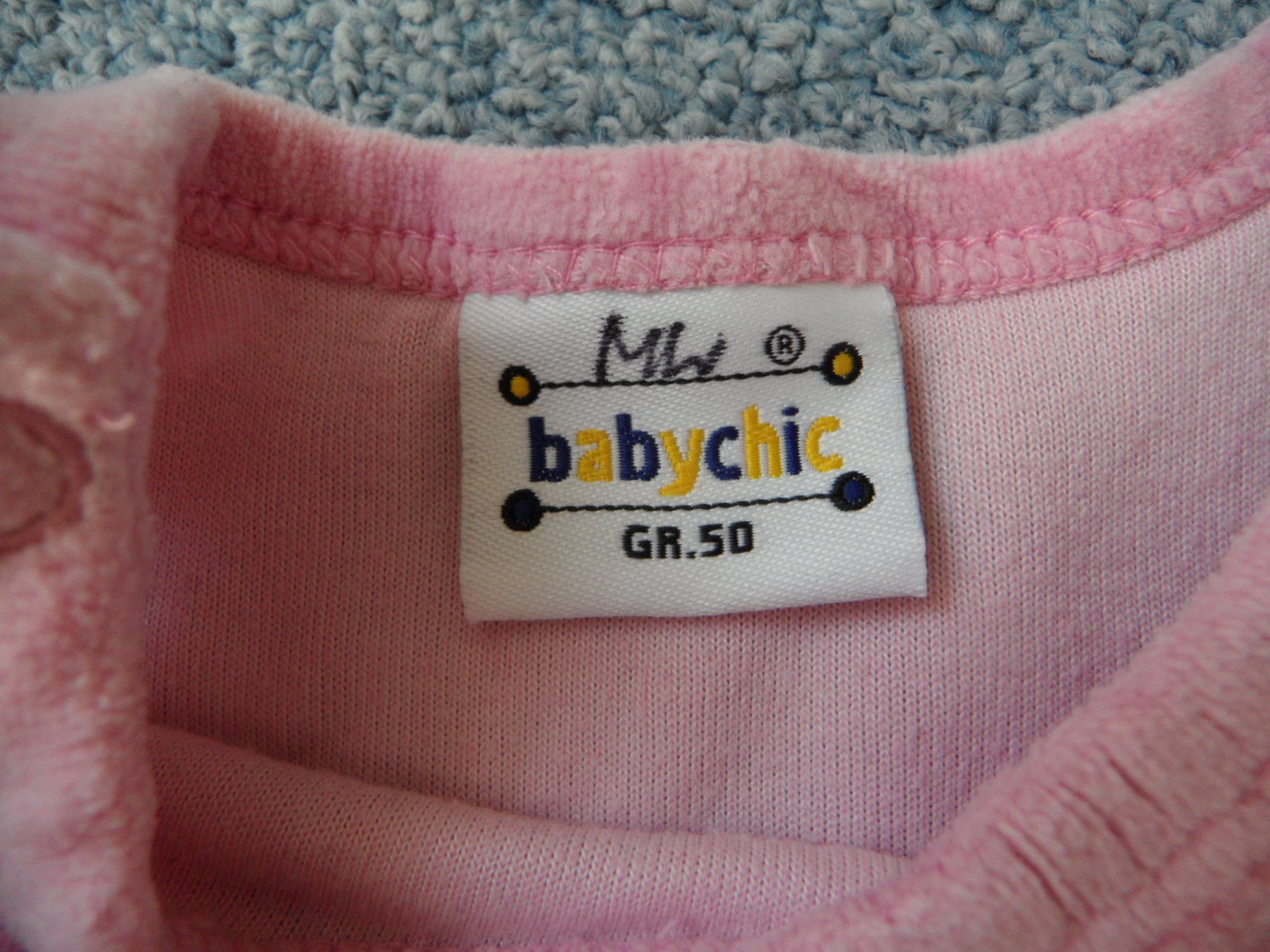 zuckersüßer Nicki-Strampler babychick mit Teddy-Applikation