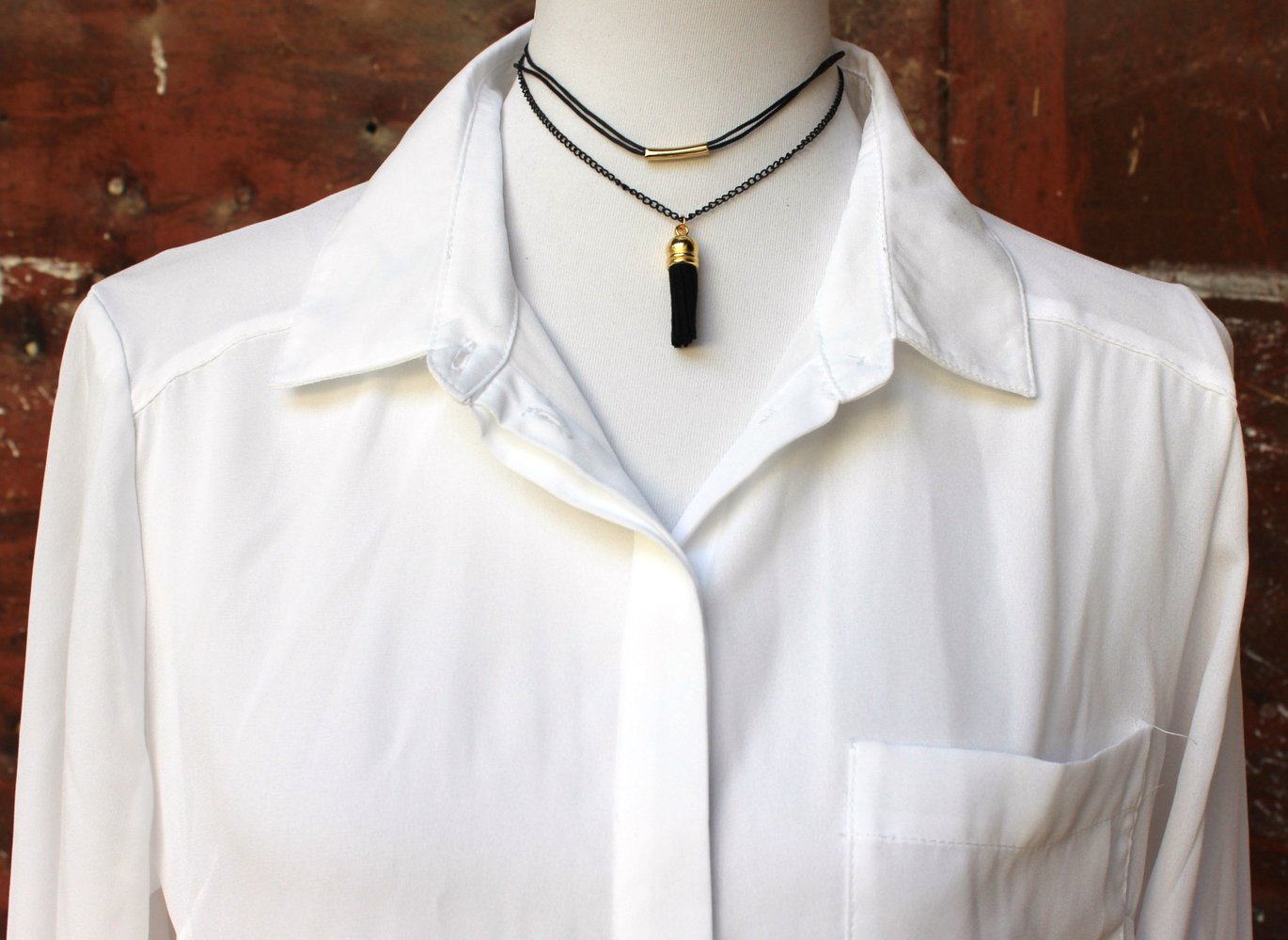 mehrreihige schwarz goldene Choker Halskette mit Bommel bzw. Quaste