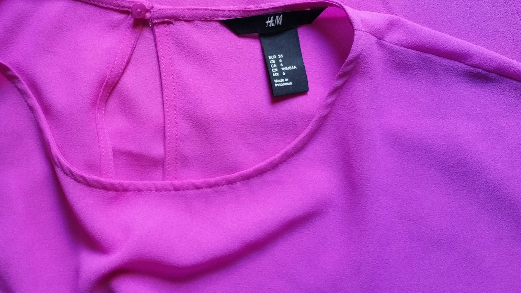 Bluse, ärmellos
