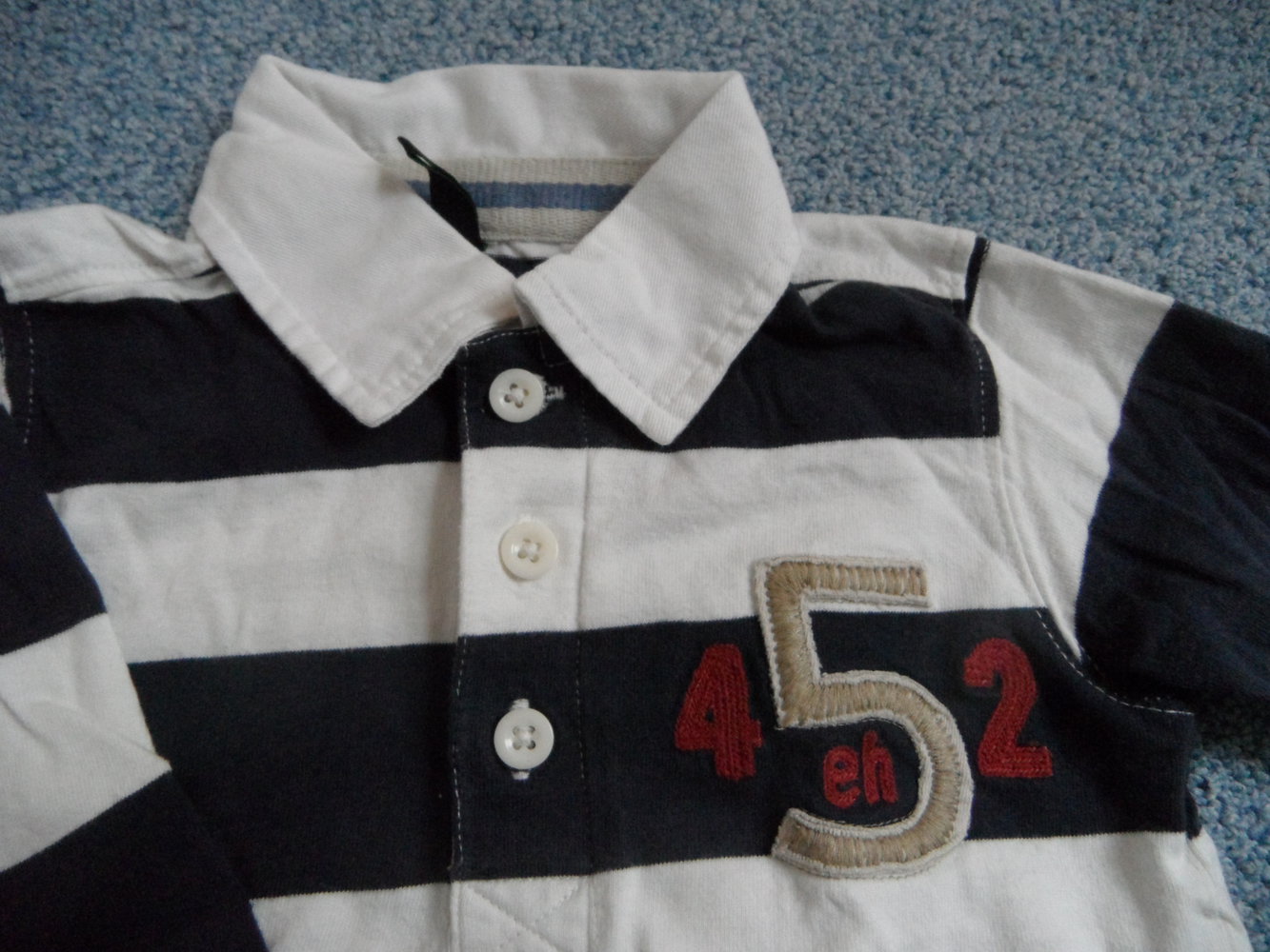 Benetton schickes Poloshirt mit tollen Details