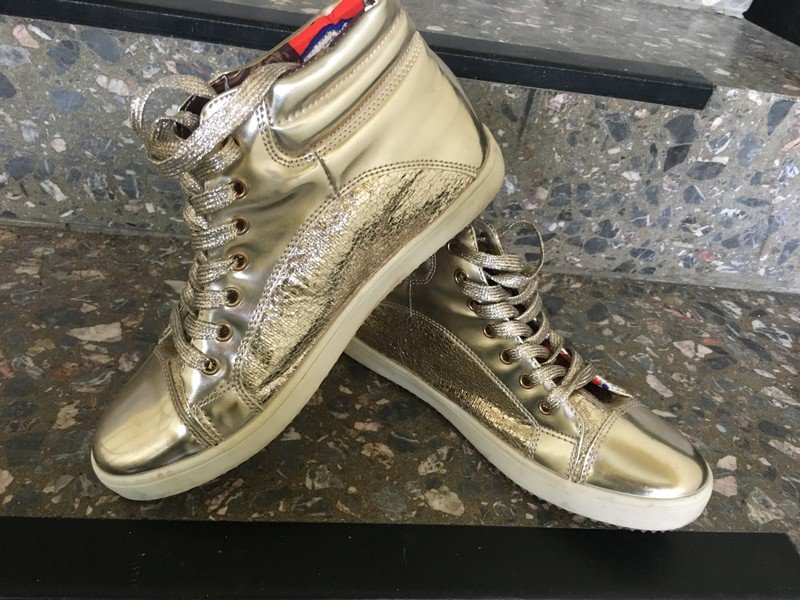 Sneakers High in gold