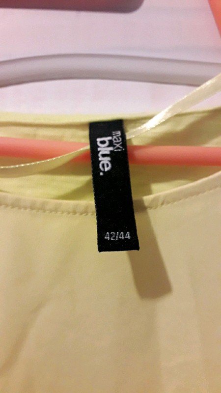 Schönes Shirt in Gelb mit 2 verschiedenen Stoffen