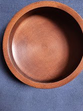 Dunkelbraune Holzschale rund 
