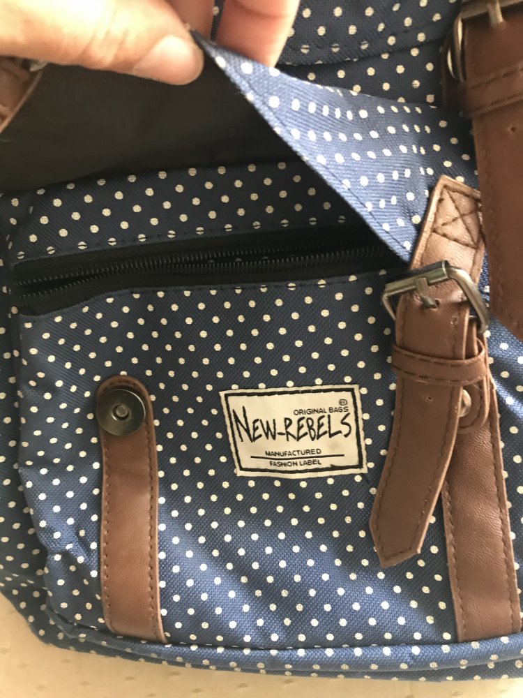 Blau/weiß gepunkteter Rucksack von New Rebels 