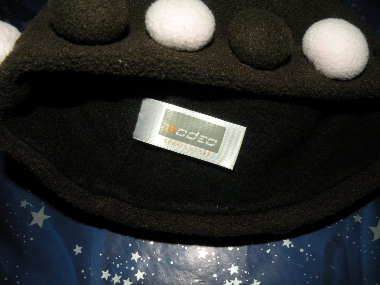 Rodeo @ C&A Zipfel Mütze braun rosa Bommeln KU 50 cm top Zustand innen Fleece warm