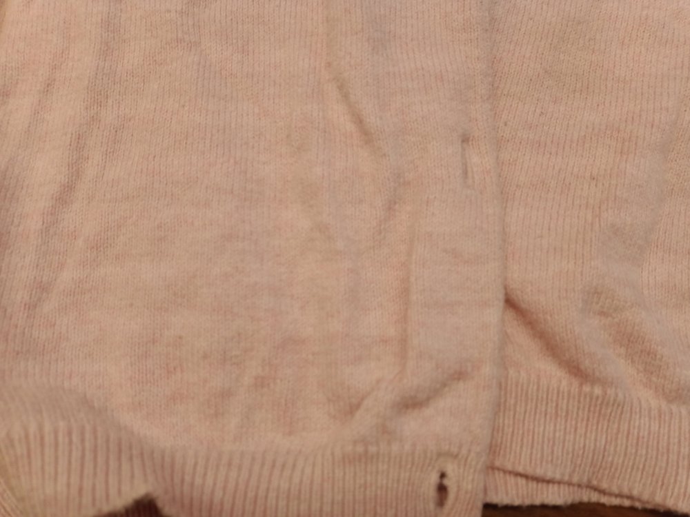 Pinkes Strickjäckchen