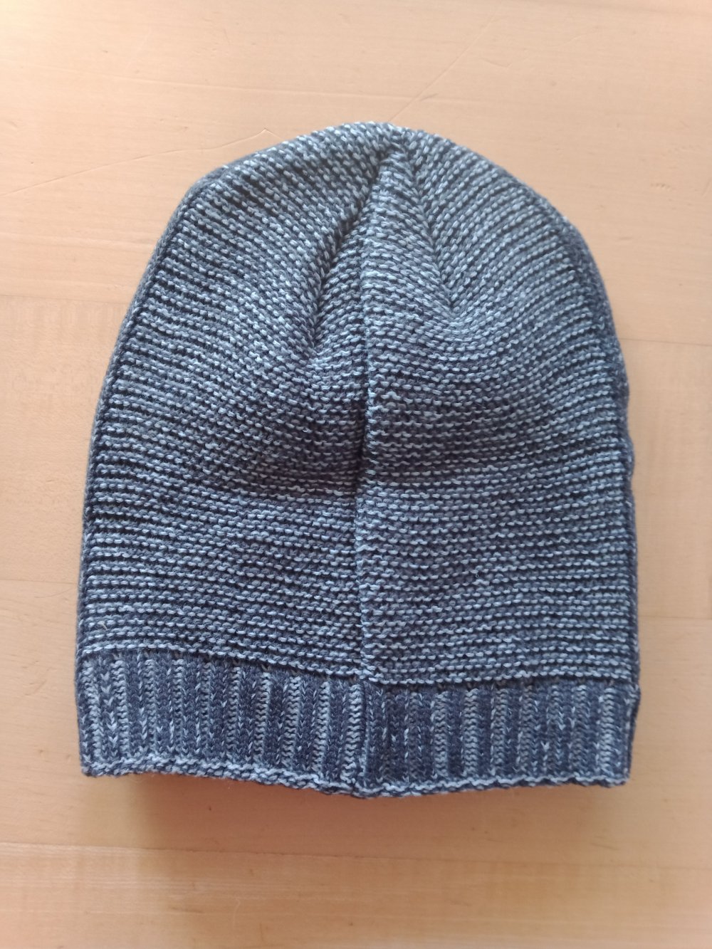 Grau melierte Mütze mit Stern gefüttert