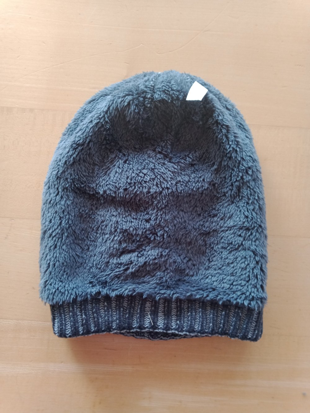 Grau melierte Mütze mit Stern gefüttert