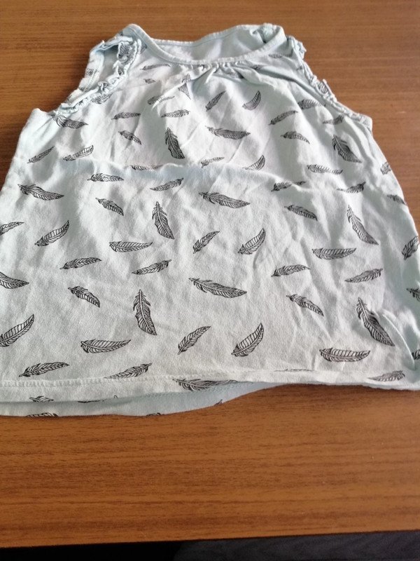 Hellblaues Top mit Aufdruck - Gr. 110/116 - H&M