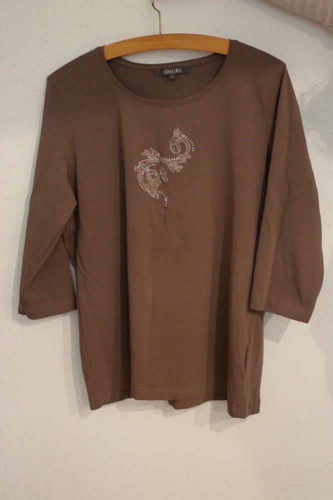 Schickes Oberteil mit Stickerei und Glitzersteinchen