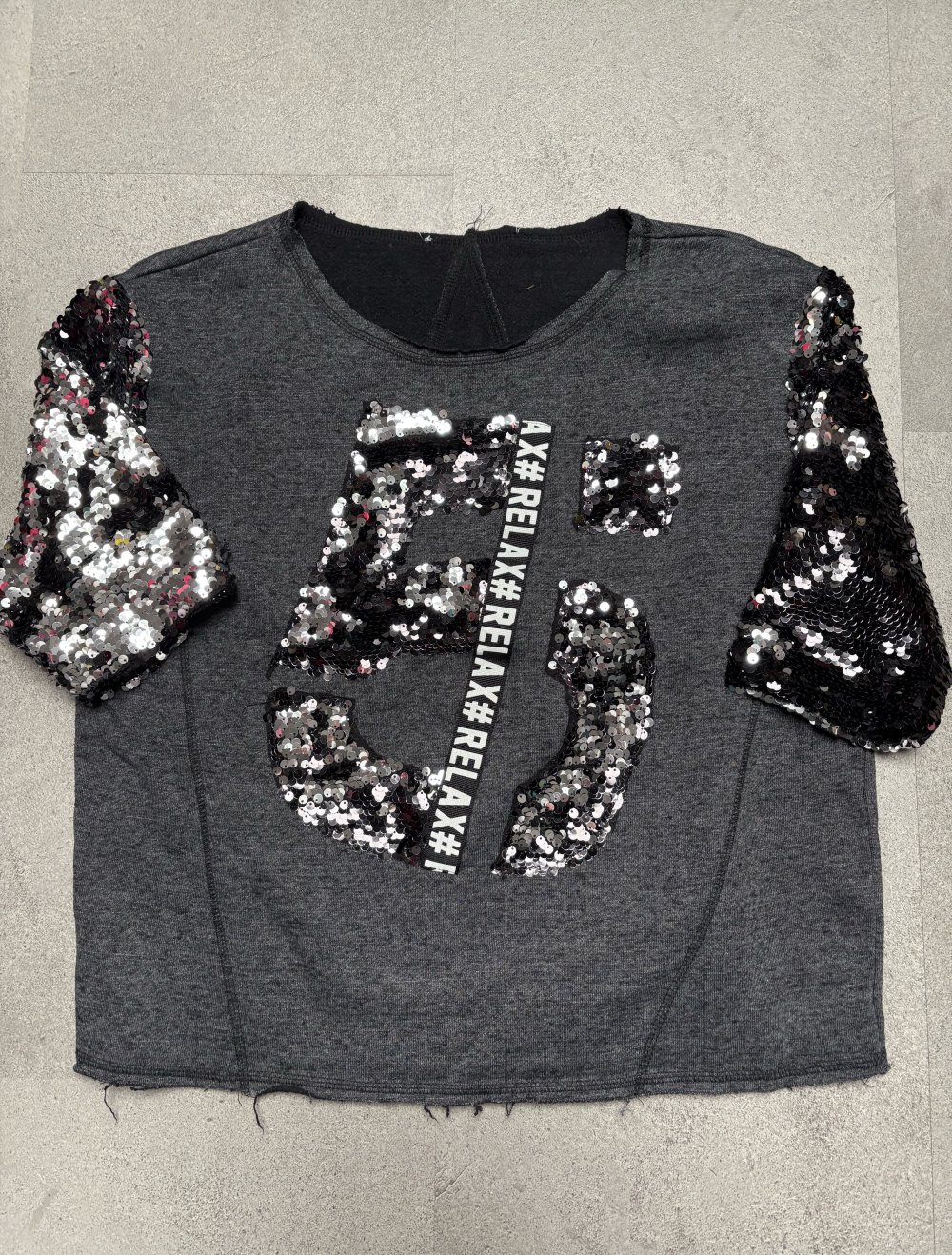 Oberteil, schwarz mit Pailletten