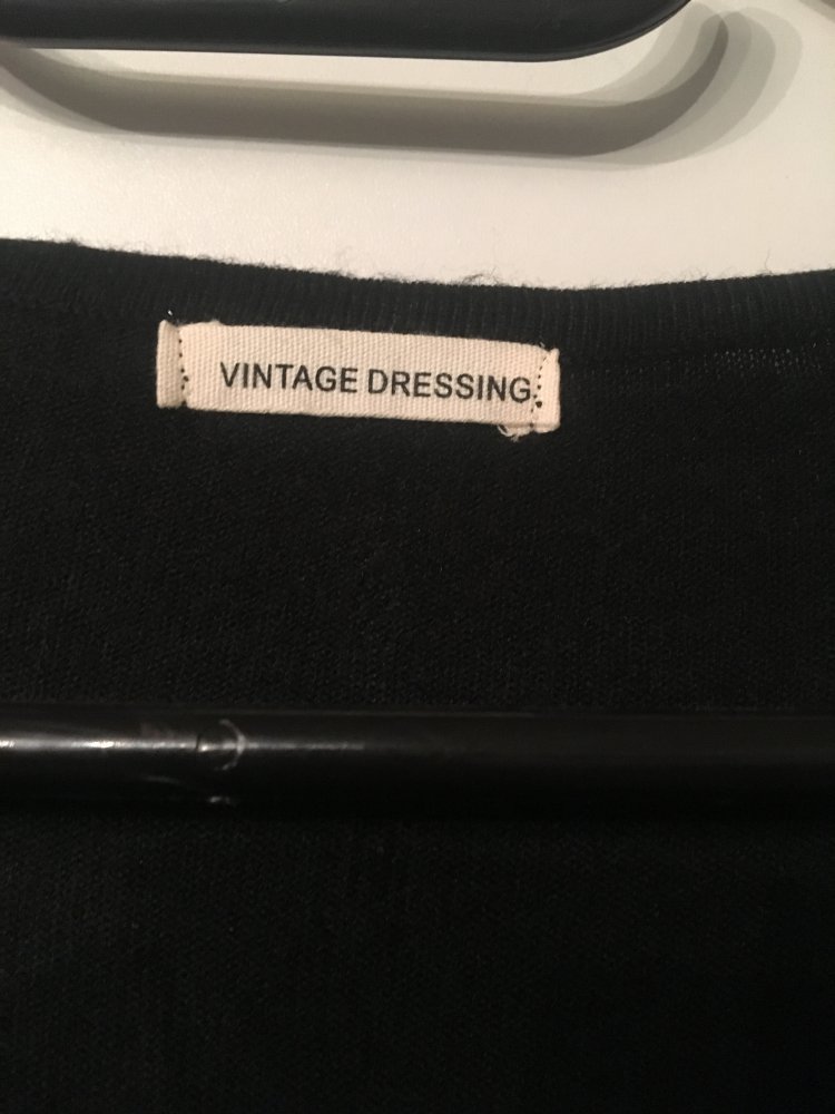 Schwarz/Goldener Pullover