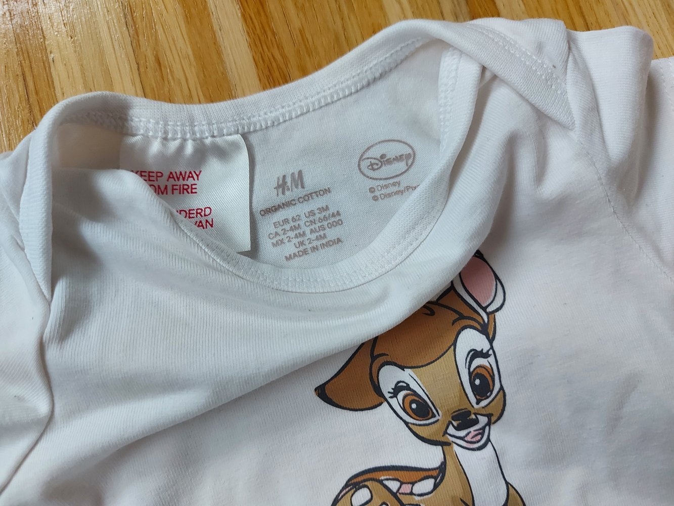 weißer Kurzarmbody mit Bambi, Gr. 62