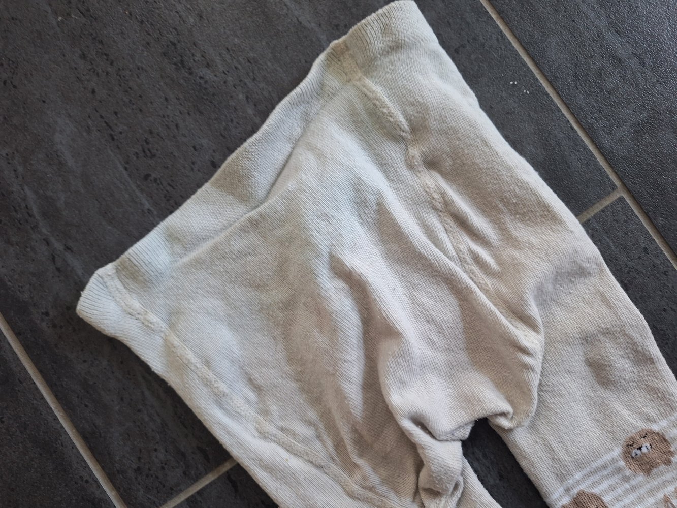 beige Strumpfhose mit Hasenmotiven Gr. 110/116