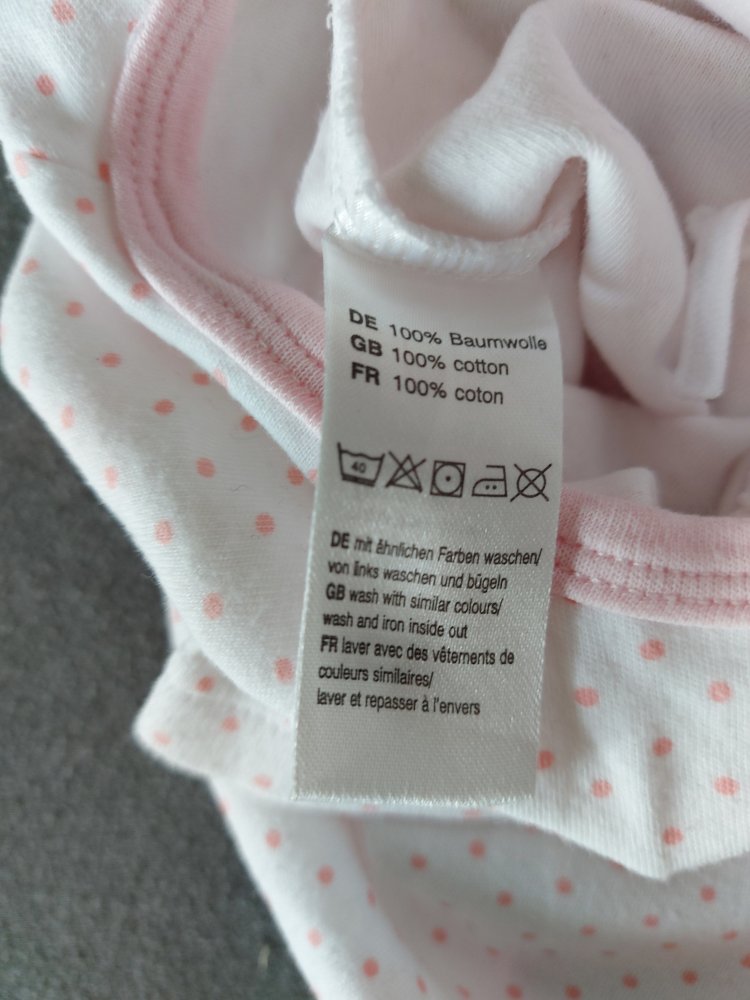 weißer Kurzarmbody mit rosa Punkten, Gr. 50/56 