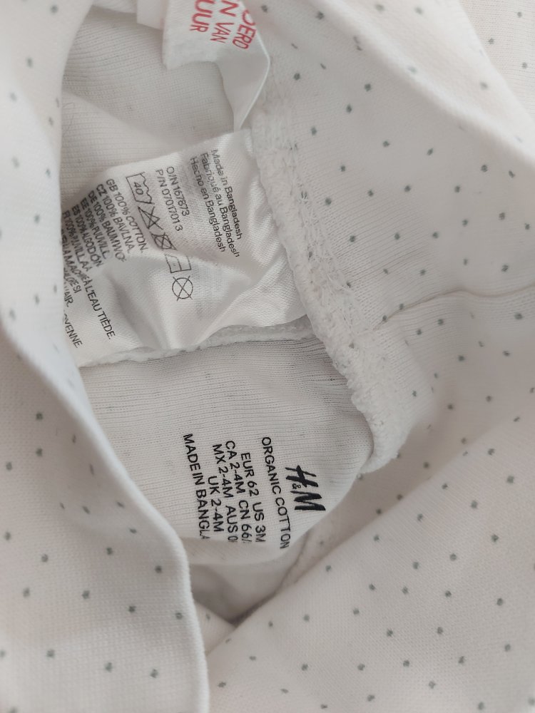 Weiße Babyhose mit Pünktchen mit breitem Bund und Füßchen Gr. 62