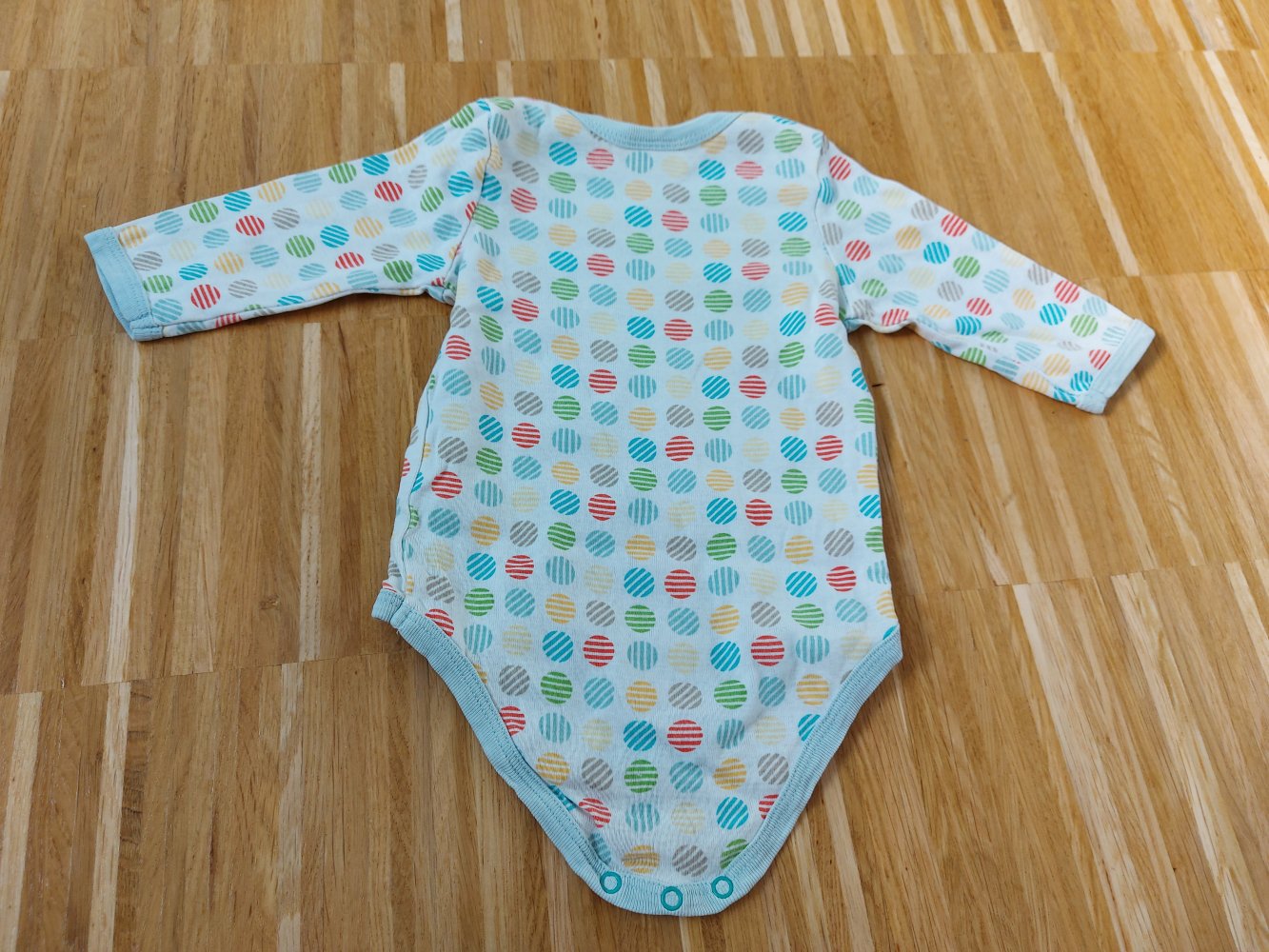 Langärmliger Badybody mit bunten Punkten Gr. 62/68